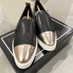 Moving sale. Karl Lagerfeld Black Slip-On Flats with Metallic Champagne Toe Caps